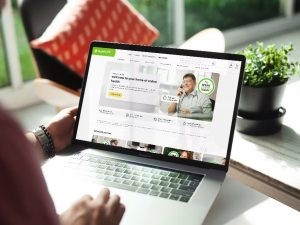 Person browsing Trade Me website on laptop