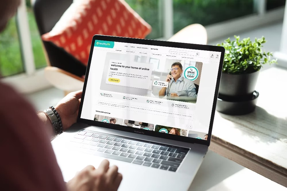 Person viewing health website on laptop indoors.